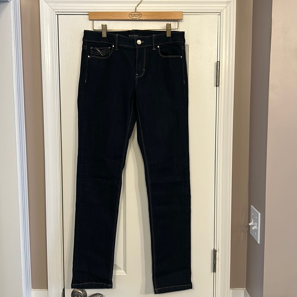 White House black market dark wash blue jeans.